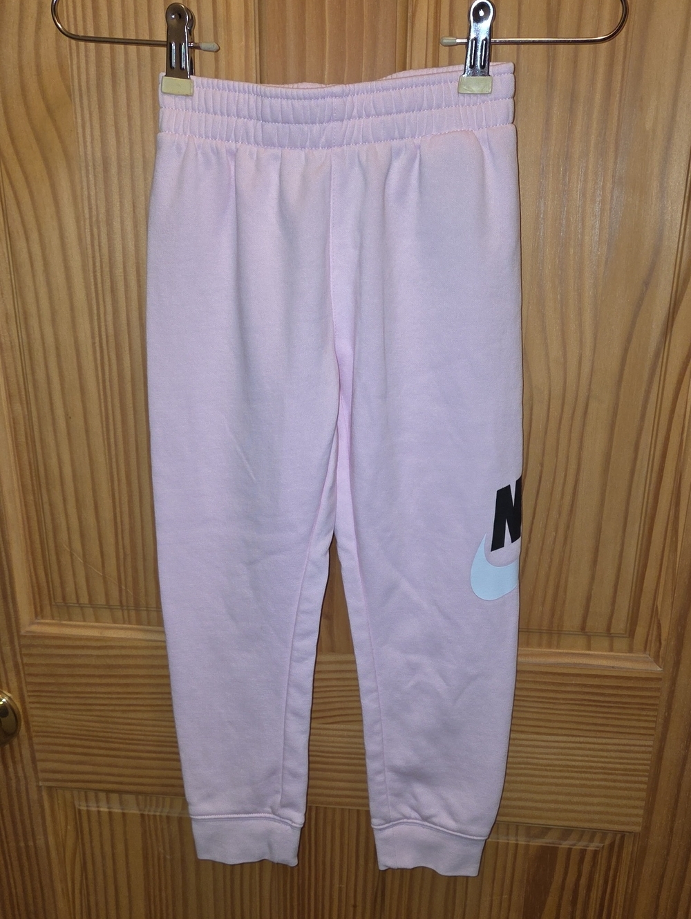 Nike Light Pink Logo Jogger Pants for Girls.